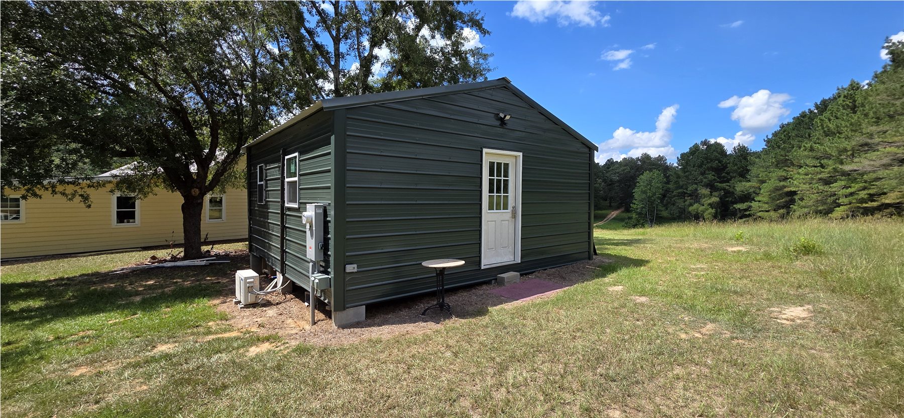 Tiny house and main house together