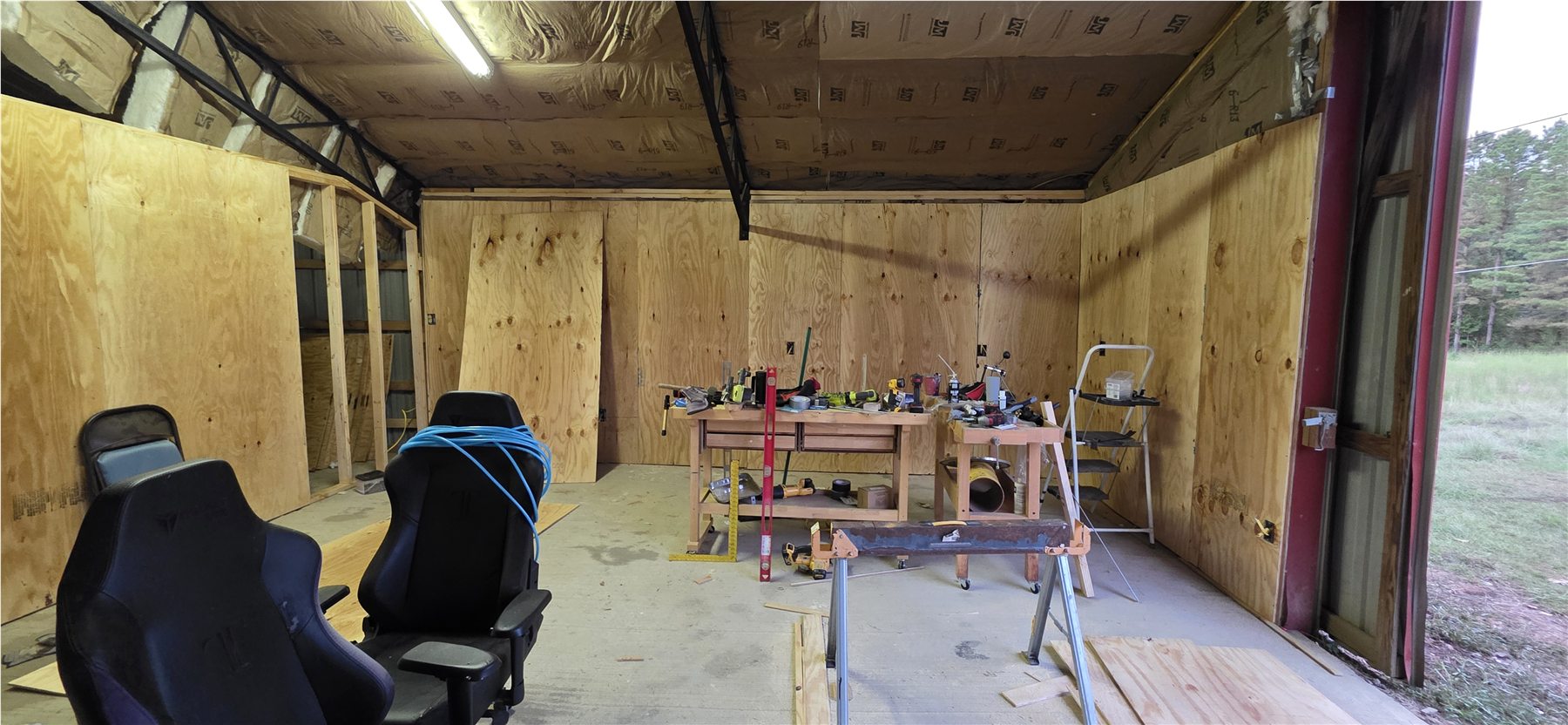 Paneled gathering room inside the barn
