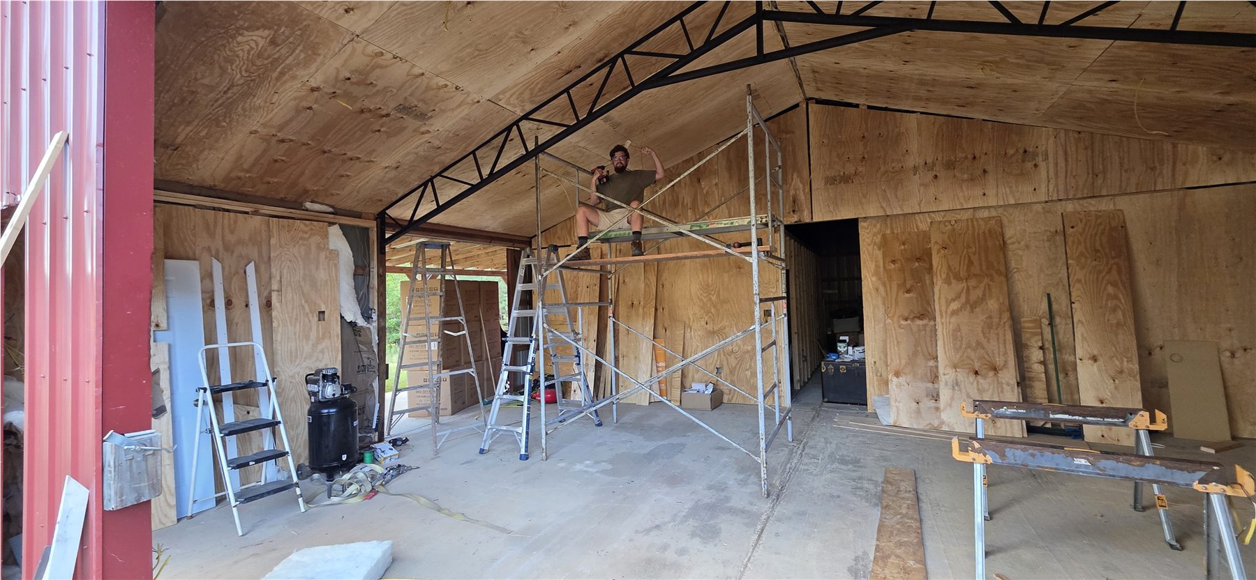 Finished wall panels and open barn doors