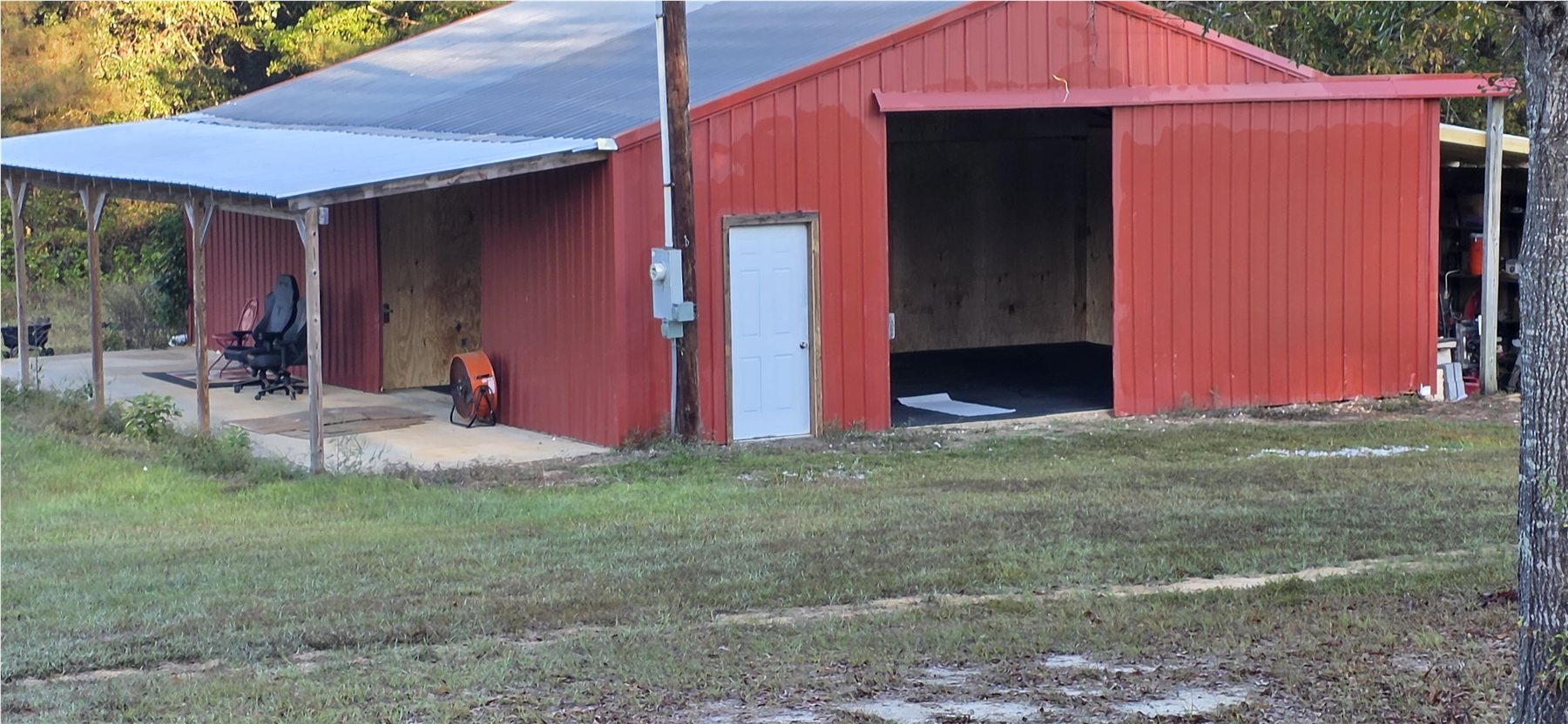 Wide exterior of the red barn