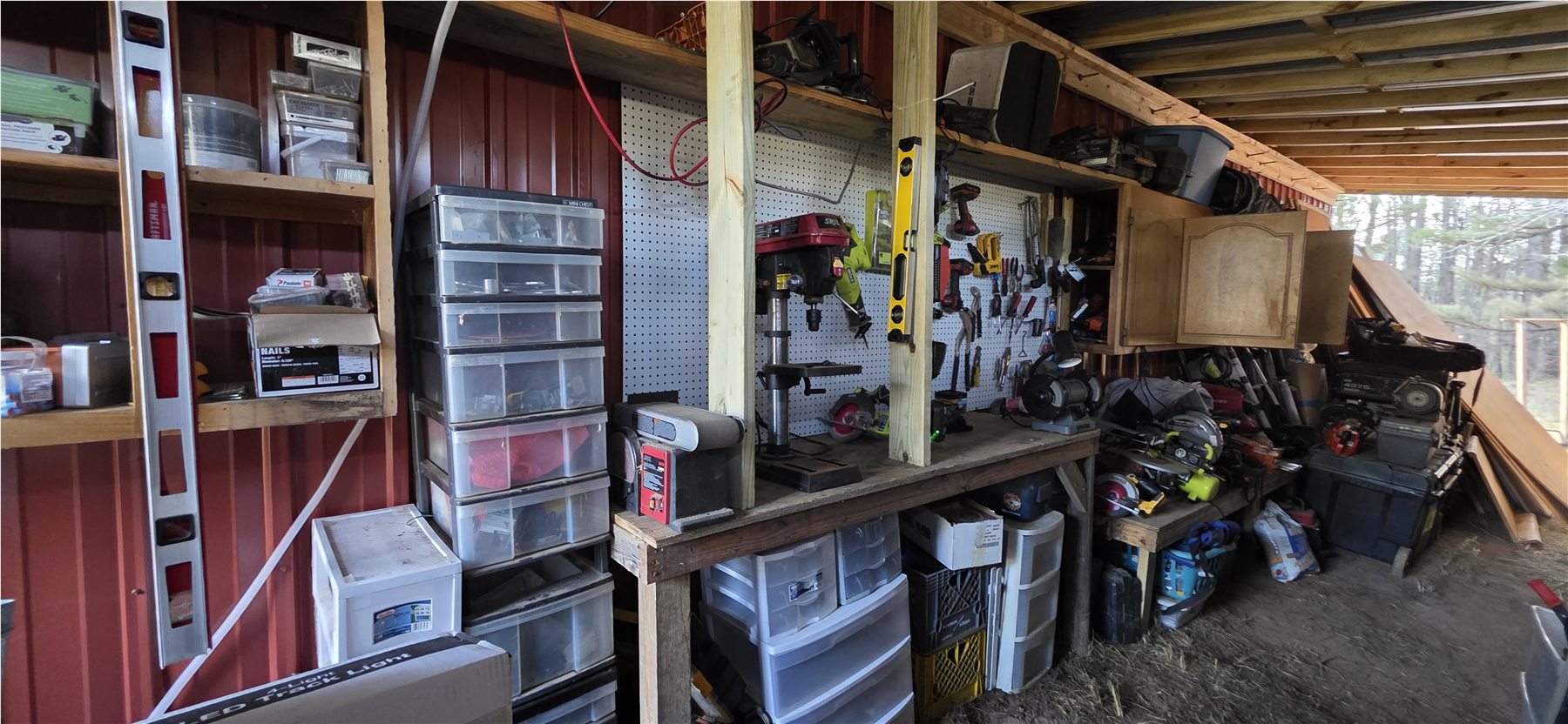 Organized workshop area inside the barn
